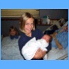 Jamie holding the baby