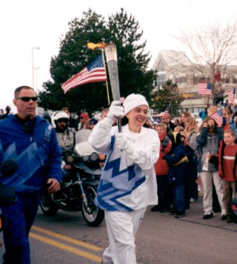 The torch runner goes by